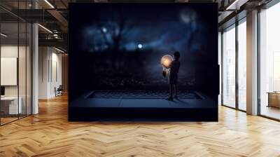 Boy holding a light bulb Wall mural