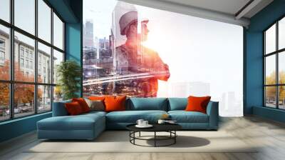 Builder man against cityscape Wall mural