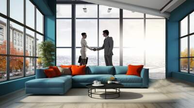 Business partners handshake . Mixed media Wall mural