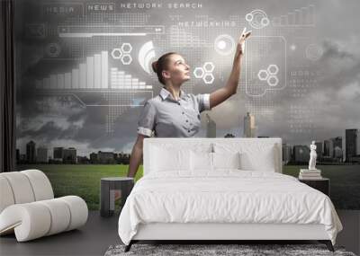 Business person with digital symbols Wall mural