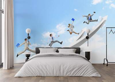 Businesspeople jumping Wall mural