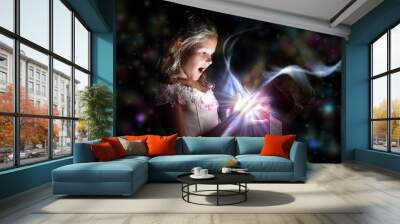 Child opening a magic gift box Wall mural