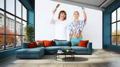 Couple with paint brushes Wall mural