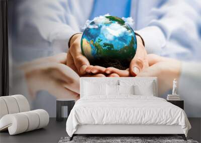 Earth planet in hands Wall mural