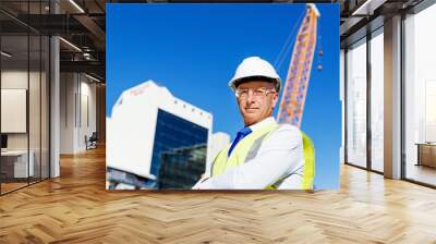 Engineer builder at construction site Wall mural