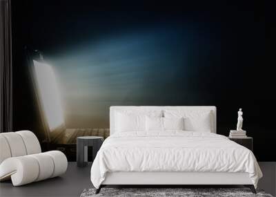 Glowing laptop Wall mural