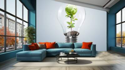 Lamp bulb with clean nature symbol inside Wall mural