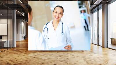 Portrait of two friendly female doctors Wall mural