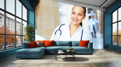 Portrait of two friendly female doctors Wall mural