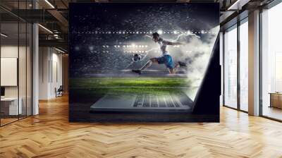 Soccer player in action. Mixed media Wall mural