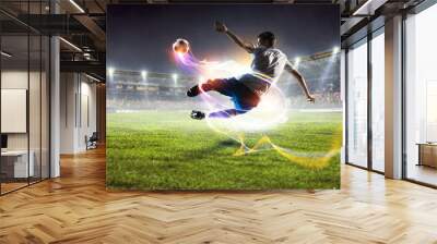 Soccer player on stadium in action. Mixed media Wall mural