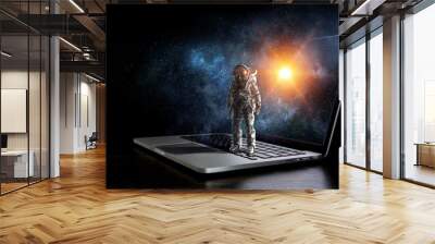 space explorer and laptop. mixed media Wall mural