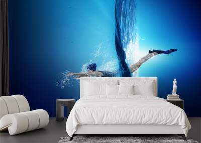 Swimmer in flippers. Mixed media Wall mural