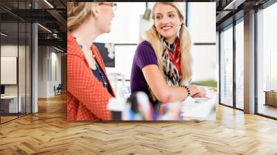 Two office workers at the desk Wall mural