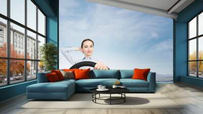 Woman with steering wheel Wall mural