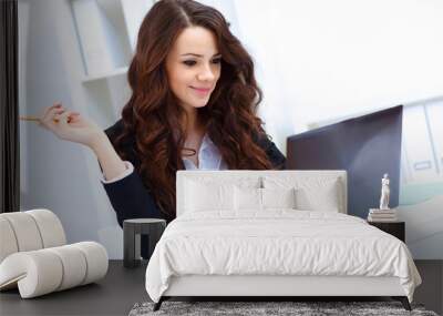 Young busines woman with notebook Wall mural