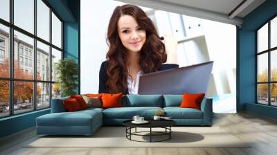 Young busines woman with notebook Wall mural