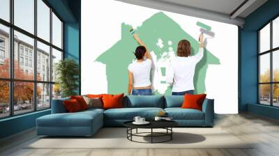 Young couple with paint brushes together Wall mural