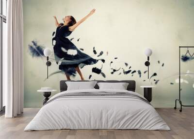 Young girl floating Wall mural