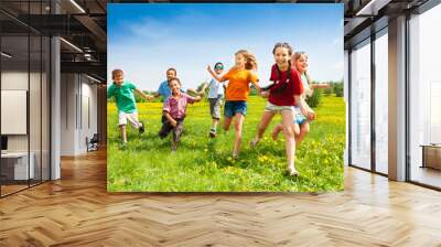 group of happy running kids Wall mural