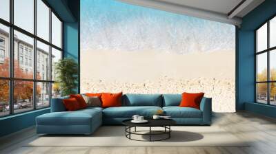 Sea beach with water hitting sand view from above Wall mural