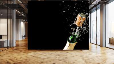 opening bottle of champagne on empty black background Wall mural