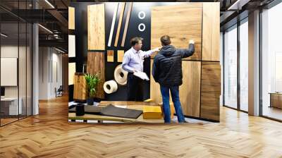 Men in shop of wooden panels Wall mural