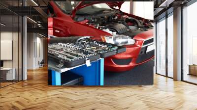 Set of tools on table in car service Wall mural