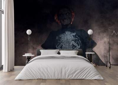 scary sorcerer in smoke. voodoo rite Wall mural