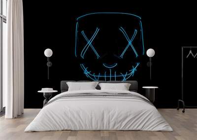 Neon blue glow mask in the dark Wall mural