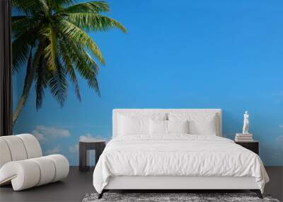 Palm tree against beautiful blue sky Wall mural