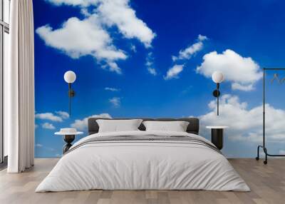 White fluffy clouds in the blue sky. Wall mural