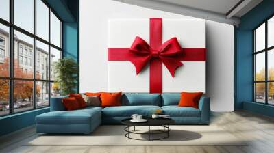 A pristine white gift box adorned with a large, vibrant red ribbon bow, symbolizing celebration, joy, and special occasions like birthdays or holidays. Wall mural