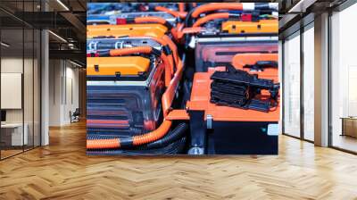 Electric car battery with power connections closeup. Blue toned. EV car battery at maintenance. High voltage power connector closeup. Wall mural