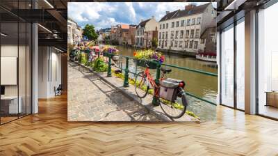 Bicycles parked by the canal in Gent Wall mural