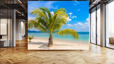 Single palm tree on beach Wall mural