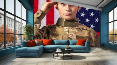 Young boy dressed like a soldier with American flag Wall mural