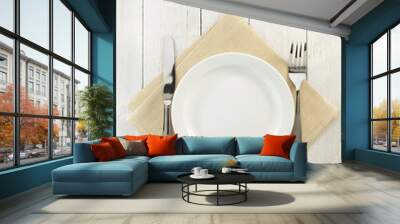 knife and fork with plate at napkin on wood Wall mural