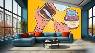 Pop Art Woman Hands Spreading Chocolate Cream on Bread Slice. Vector illustration Wall mural