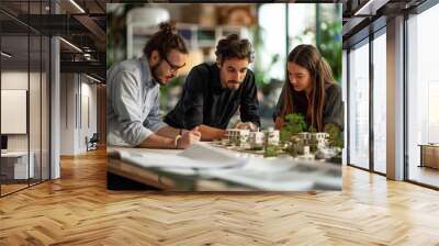 Architects collaborate on green city architecture model in modern office Wall mural