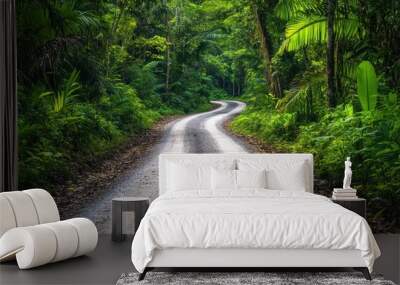 Ground rural road in the middle of a tropical jungle, surrounded by lush greenery and dense foliage. Wall mural