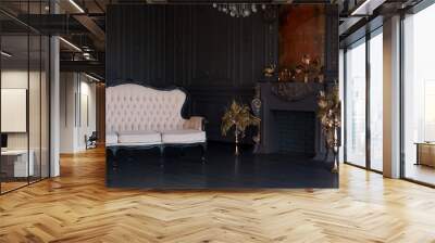 Black room interior with a vintage sofa, chandelier, mirror and fireplace Wall mural