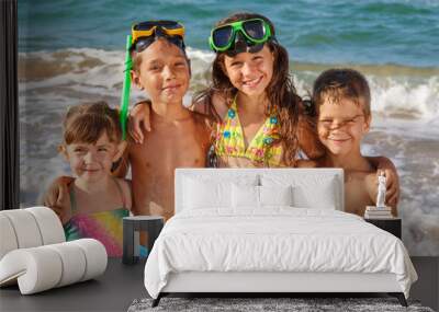 Four kids on the beach Wall mural