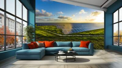 Solar panels at sunrise with dramatic cloudy sky in Normandy, France. Modern electric power production technology. Environmentally friendly electricity production Wall mural