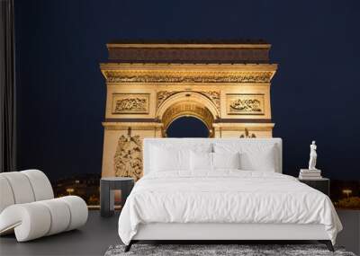 Triumphal arch. Paris. France. View Place Charles de Gaulle. Famous touristic architecture landmark in summer night. Napoleon victory monument. Symbol of french glory. World historical heritage. Toned Wall mural