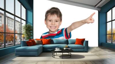 Laughing boy points aside Wall mural