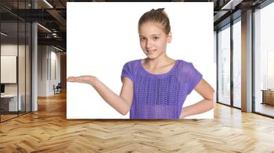 Smiling preteen girl makes a hand gesture Wall mural