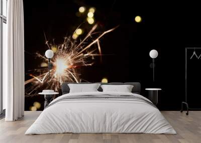 Bengal fire on blurred background with bokeh, new year and Christmas holidays, banner Wall mural