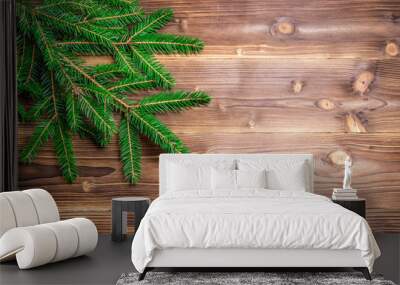 Christmas green pine fir spruce branch on wooden background Wall mural