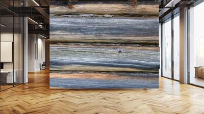 Old wooden wall made of uncolored natural pine tree logs, Texture of the wall made of logs of an old wooden house. Wall mural